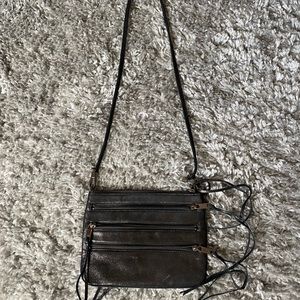 Rebecca Minkoff black metallic cross body purse.